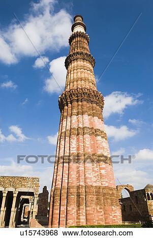 Low angle view of a tower monument, Qutab Minar, New Delhi, India View Large Photo Image Stock Photo - Low angle view of a tower monument, Qutab Minar, New Delhi, India. Fotosearch