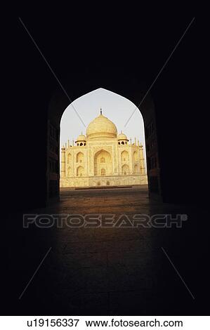 Stock Photo - Mausoleum viewed through an arch, Taj Mahal, Agra, Uttar Pradesh, India. Fotosearch