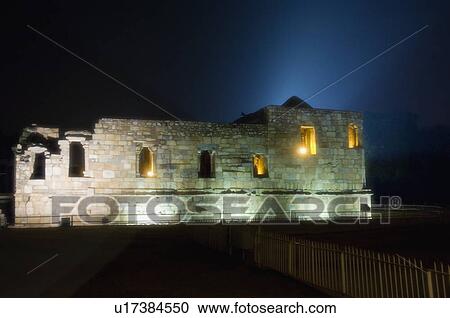 Stock Image - Monument lit up at night, Qutub Minar, New Delhi, India. Fotosearch
