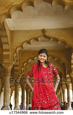 Stock Photo - Portrait of a young woman smiling, Agra Fort, Agra, Uttar Pradesh, India. Fotosearch