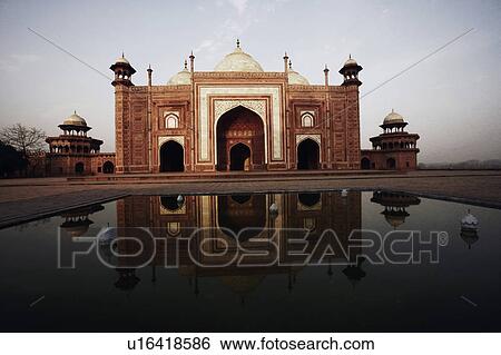 Stock Photograph - Reflection of a mausoleum in water, Taj Mahal, Agra, Uttar Pradesh, India. Fotosearch