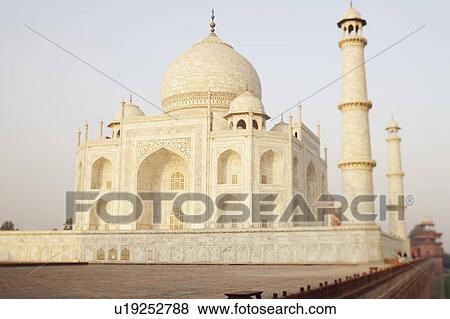 Tourist walking on a walkway, Taj Mahal, Agra, Uttar Pradesh, India View Large Photo Image Stock Photo - Tourist walking on a walkway, Taj Mahal, Agra, Uttar Pradesh, India. Fotosearch