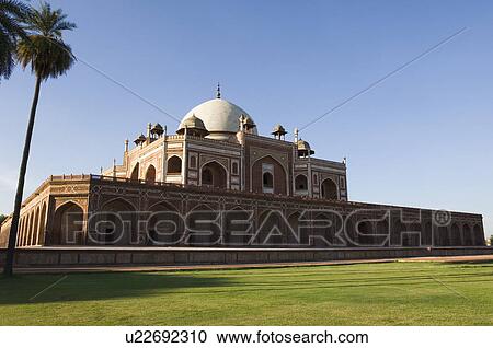 Stock Image - Lawn beside a tomb, Humayun Tomb, New Delhi, India. Fotosearch