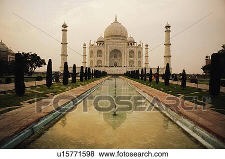 Reflection of a mausoleum in water, Taj Mahal, Agra, Uttar Pradesh, India View Large Photo Image Stock Photo - Reflection of a mausoleum in water, Taj Mahal, Agra, Uttar Pradesh, India. Fotosearch