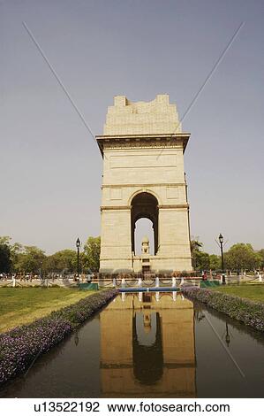 Reflection of a monument in water, India Gate, New Delhi, India View Large Photo Image Stock Image - Reflection of a monument in water, India Gate, New Delhi, India. Fotosearch