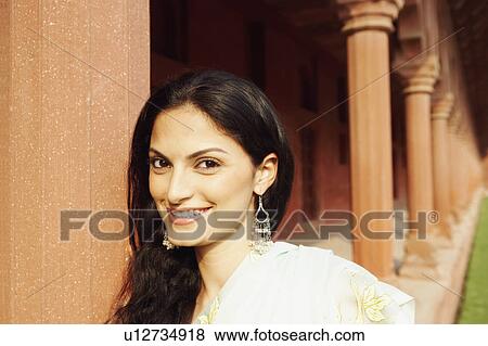 Stock Photo - Portrait of a young woman in a mausoleum, Taj Mahal, Agra, Uttar Pradesh, India. Fotosearch