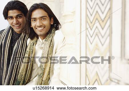 Picture - Portrait of two young men smiling, Taj Mahal, Agra, Uttar Pradesh, India. Fotosearch