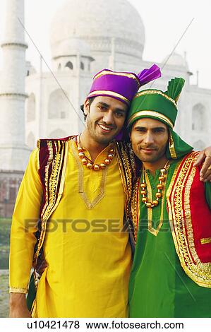Portrait of two young men standing in front of a mausoleum, Taj Mahal, Agra, Uttar Pradesh, India View Large Photo Image Stock Photo - Portrait of two young men standing in front of a mausoleum, Taj Mahal, Agra, Uttar Pradesh, India. Fotosearch