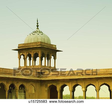 Stock Image - Pillars in a corridor across the courtyard of a mosque, Jama Masjid, New Delhi, India. Fotosearch