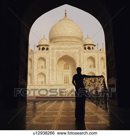 Silhouette of a woman standing in front of a mausoleum, Taj Mahal, Agra, Uttar Pradesh, India View Large Photo Image Stock Photograph - Silhouette of a woman standing in front of a mausoleum, Taj Mahal, Agra, Uttar Pradesh, India. Fotosearch