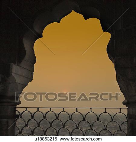 Sunset viewed through a balcony View Large Photo Image Stock Photography - Sunset viewed through a balcony. Fotosearch
