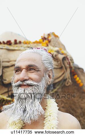 Stock Photography - Close-up of a priest smiling. Fotosearch