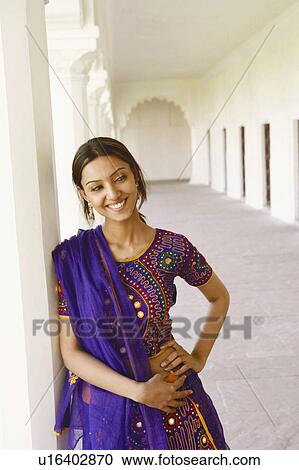 Close-up of a young woman leaning against a column, Agra Fort, Agra, Uttar Pradesh, India View Large Photo Image Stock Image - Close-up of a young woman leaning against a column, Agra Fort, Agra, Uttar Pradesh, India. Fotosearch