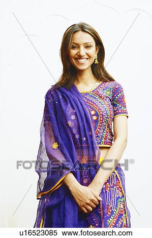 Portrait of a young woman smiling View Large Photo Image Stock Photography - Portrait of a young woman smiling. Fotosearch