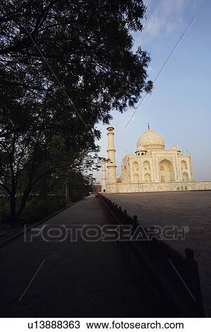 Stock Image - Courtyard in front of a mausoleum, Taj Mahal, Agra, Uttar Pradesh, India. Fotosearch