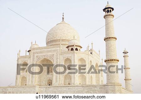 Stock Image - Facade of a mausoleum, Taj Mahal, Agra, Uttar Pradesh, India. Fotosearch