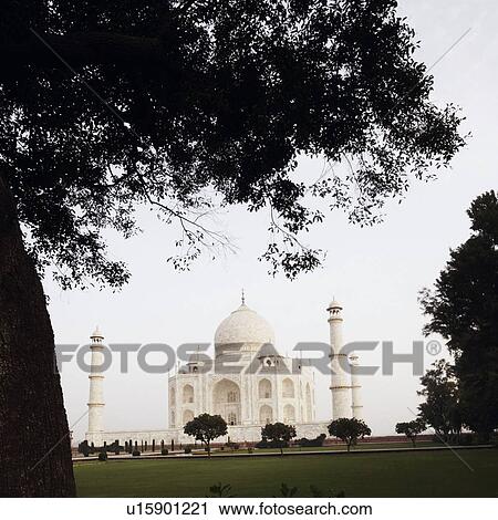 Stock Image - Garden in front of a mausoleum, Taj Mahal, Agra, Uttar Pradesh, India. Fotosearch