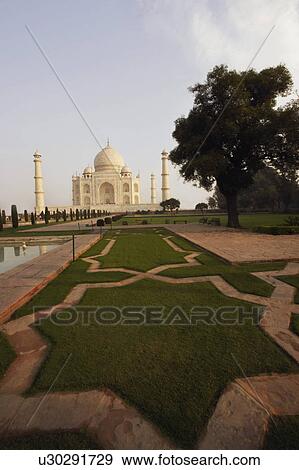 Garden in front of a mausoleum, Taj Mahal, Agra, Uttar Pradesh, India View Large Photo Image Stock Photo - Garden in front of a mausoleum, Taj Mahal, Agra, Uttar Pradesh, India. Fotosearch