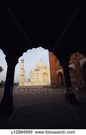 Mausoleum viewed through an arch, Taj Mahal, Agra, Uttar Pradesh, India View Large Photo Image Stock Photo - Mausoleum viewed through an arch, Taj Mahal, Agra, Uttar Pradesh, India. Fotosearch