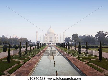 Stock Photo - Reflection of a mausoleum in the pond, Taj Mahal, Agra, Uttar Pradesh, India. Fotosearch