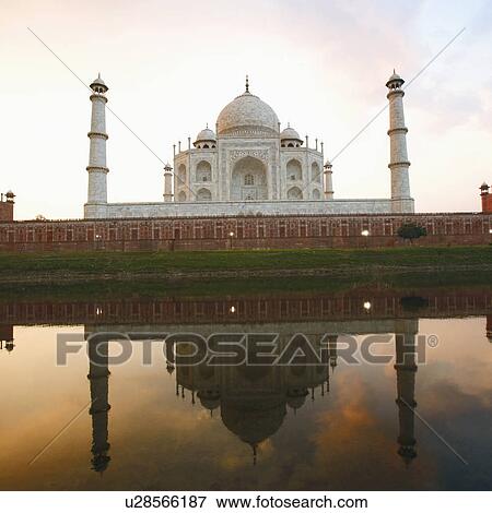 Reflection of a mausoleum in water, Taj Mahal, Agra, Uttar Pradesh, India View Large Photo Image Stock Photo - Reflection of a mausoleum in water, Taj Mahal, Agra, Uttar Pradesh, India. Fotosearch