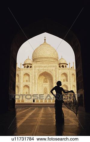 Silhouette of a woman standing in front of a mausoleum, Taj Mahal, Agra, Uttar Pradesh, India View Large Photo Image Picture - Silhouette of a woman standing in front of a mausoleum, Taj Mahal, Agra, Uttar Pradesh, India. Fotosearch
