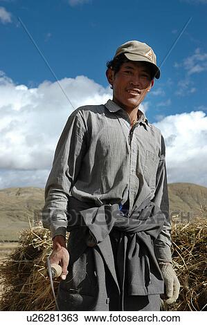 Portrait of a farmer in a hilly area. View Large Photo Image Stock Image - Portrait of a farmer in a hilly area.. Fotosearch