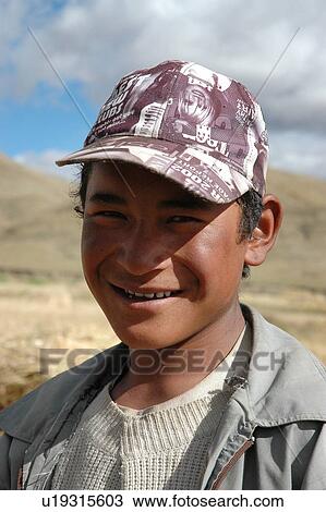 Portrait of a young man in a hilly area. View Large Photo Image Stock Image - Portrait of a young man in a hilly area.. Fotosearch