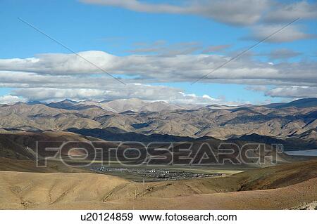 Stock Photo - Scenic landscape during cloudy day.. Fotosearch