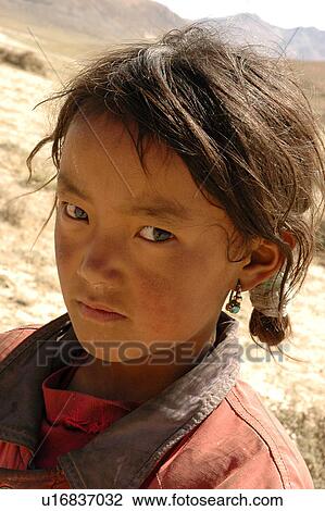 Stock Image - View of a girl staring.. Fotosearch