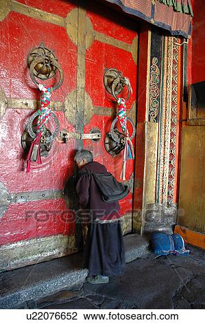 View of an elderly man praying near the wall of monastery. View Large Photo Image Stock Image - View of an elderly man praying near the wall of monastery.. Fotosearch