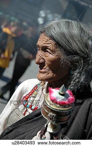 View of an elderly woman in an ethnic dress. View Large Photo Image Stock Image - View of an elderly woman in an ethnic dress.. Fotosearch