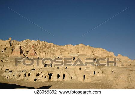 Stock Image - View of structures carved in mountains.. Fotosearch