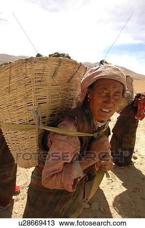 View of women carrying wicker baskets. View Large Photo Image Stock Image - View of women carrying wicker baskets.. Fotosearch