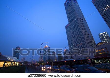 An road passing through business district View Large Photo Image Stock Image - An road passing through business district. Fotosearch