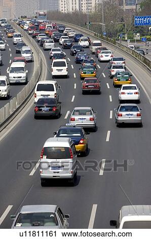 Stock Image - China, Beijing, Heavy traffic on road. Fotosearch