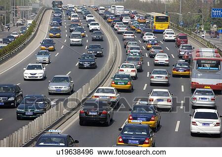 Stock Photograph - China, Beijing, Heavy traffic on road. Fotosearch