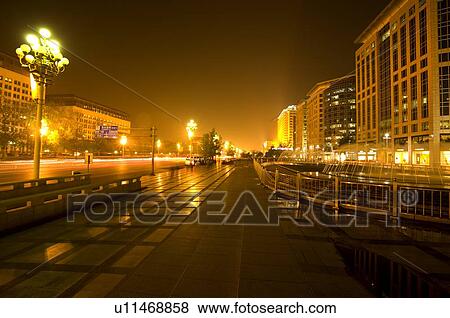 China, Beijing, Side view of Oriental Plaza at night View Large Photo Image Stock Photo - China, Beijing, Side view of Oriental Plaza at night. Fotosearch