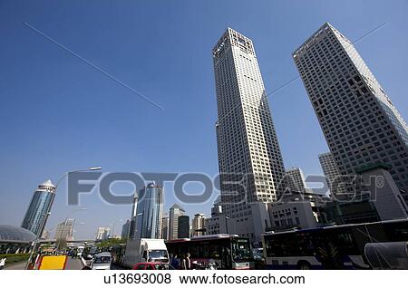 China, Beijing, Skyscrapers standing beside busy road View Large Photo Image Stock Photo - China, Beijing, Skyscrapers standing beside busy road. Fotosearch