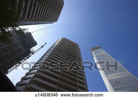 Stock Photograph - Skyscrapers and construction site in Beijing, China. Fotosearch