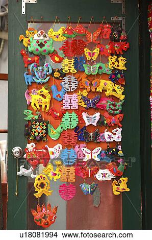 Picture - Handicrafts hanging on door. Fotosearch