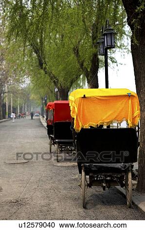 Rickshaw parking in street View Large Photo Image Stock Image - Rickshaw parking in street. Fotosearch