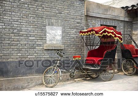 Stock Photo - Rickshaw parking in the street. Fotosearch