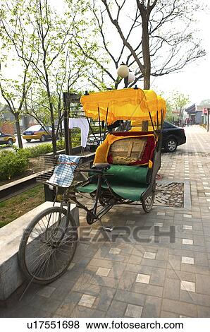 Stock Photo - Rickshaw parking in the street. Fotosearch