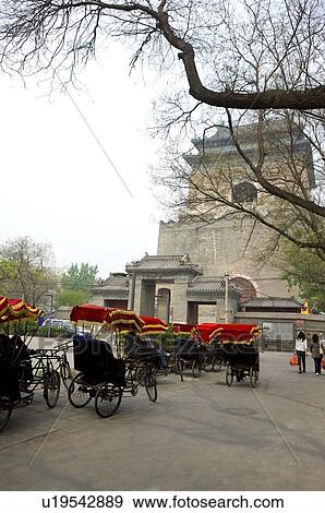 Rickshaws parking in front of Bell Tower View Large Photo Image Stock Photo - Rickshaws parking in front of Bell Tower. Fotosearch