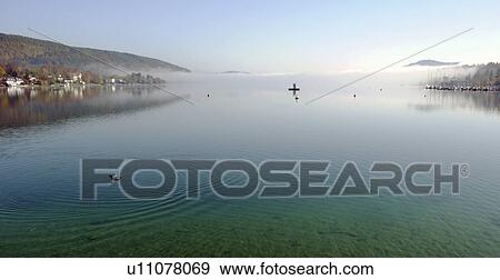 Stock Photo - grund, Austria, autumn, boats, buoy, camphora. Fotosearch
