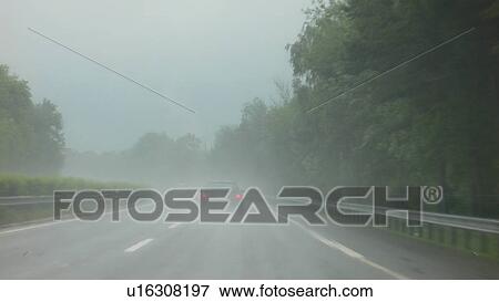 Stock Photo - danger, blue, cornelia, car, bushes, accident. Fotosearch