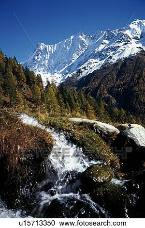 Stock Image - CAN clay/tone, alps, blue, Bernhard, autumn, Alps. Fotosearch