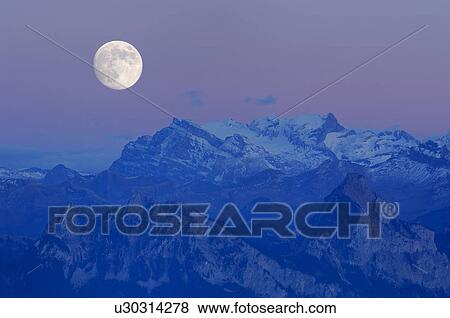 Stock Photo - huwiler, big, full moon, Central Switzerland, canton, inside Switzerland, Alps. Fotosearch