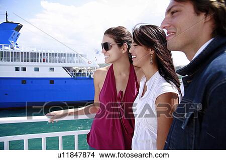 Young people at ferry dock View Large Photo Image Picture - Young people at ferry dock. Fotosearch